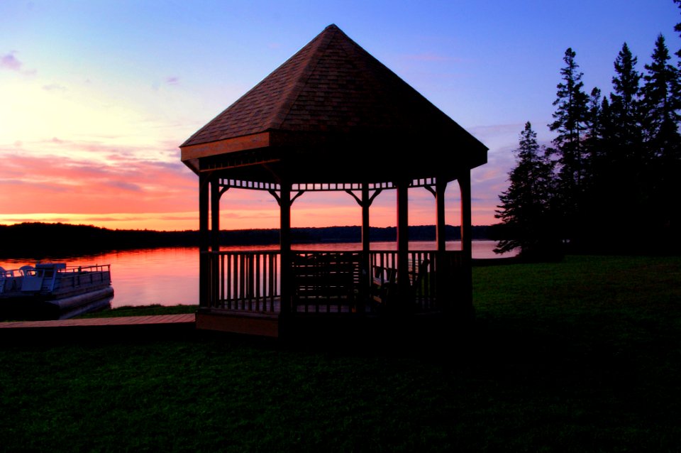Brown Canopy Tent Near On Body Of Water