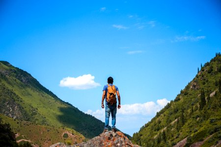 Man On Top Of Mountain photo