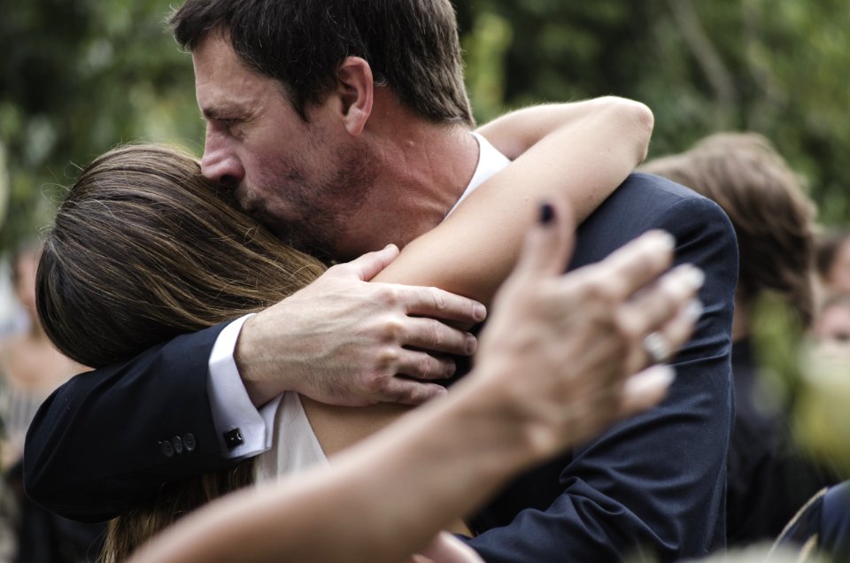 Man And Woman Hugging While Man Kissing Womans Head