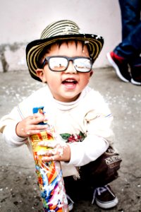 Photography Of Kid Wearing Sunglasses photo