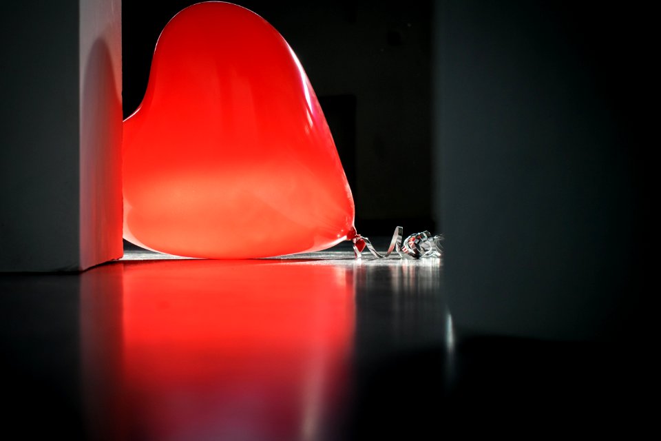 Red Heart Balloon On Top Of Floor