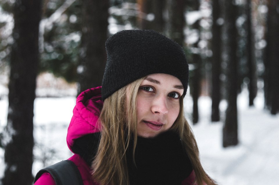 Woman In Pink And Black Jacket On White Snow photo