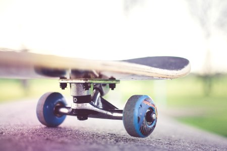 Tilt Shift Lens Photography Of Black Skateboard photo