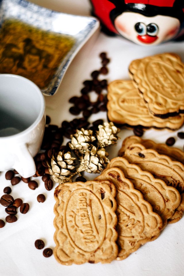 Bunch Of Biscuits Beside Beans And Mug