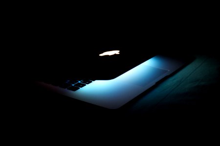 Photography Of A Turned On Macbook