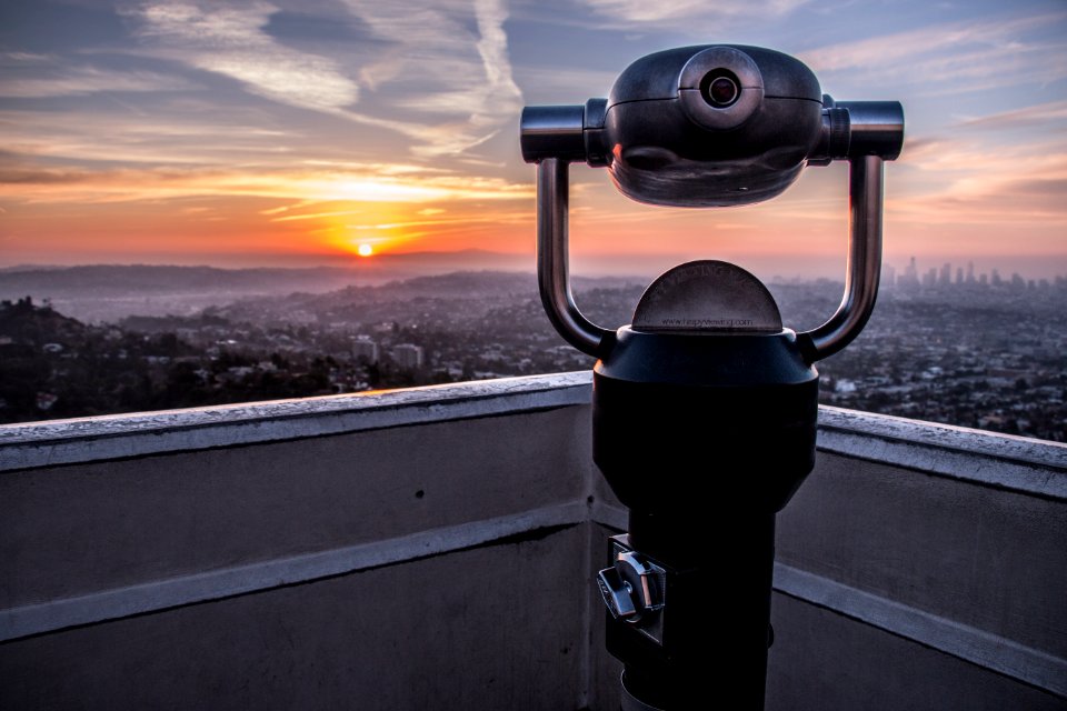 Coin-operated Tower Viewer On Rooftop During Sunset