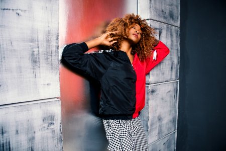 Woman In Red And Black Bomber Jacket photo