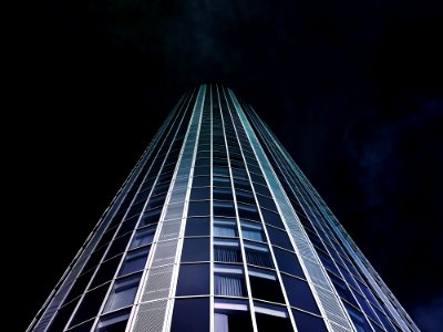 Worms Eye View Of High-rise Building During Nighttime photo