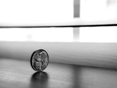 Monochrome Photography Of Round Silver Coin photo