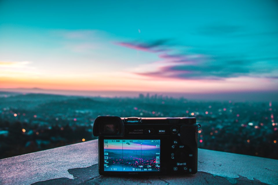 Camera Taking Picture Of City