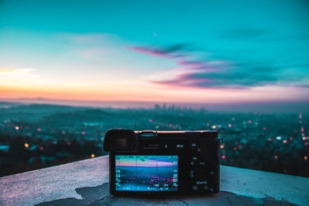 Camera Taking Picture Of City