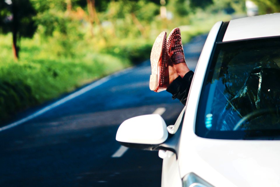 Person Wearing Pair Of Brown Leather Loafers photo