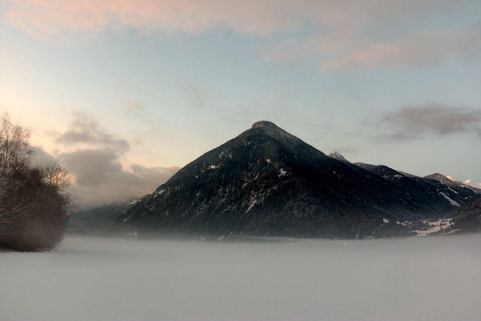 Black Mountain Under Cloudy Sky