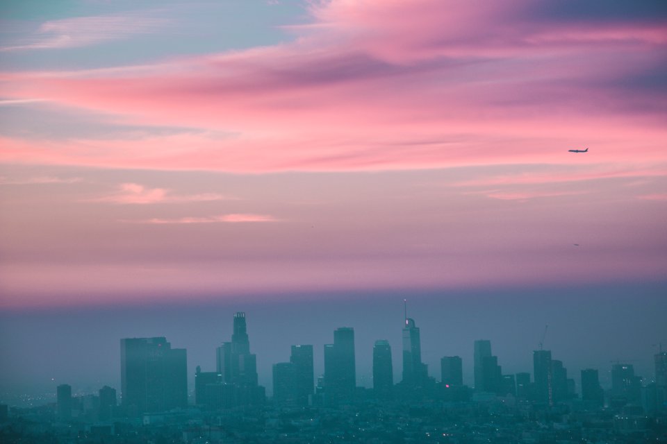 Top View Of High Rise Buildings Under Sunset
