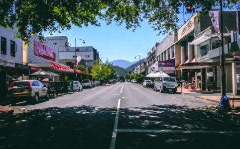 Photography Of Roadway With Parked Cars photo