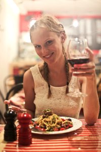 Woman In White Sleeveless Tops Holding Wine Glass photo