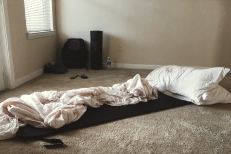 Two White Rectangular Pillows With White Blanket On Floor photo