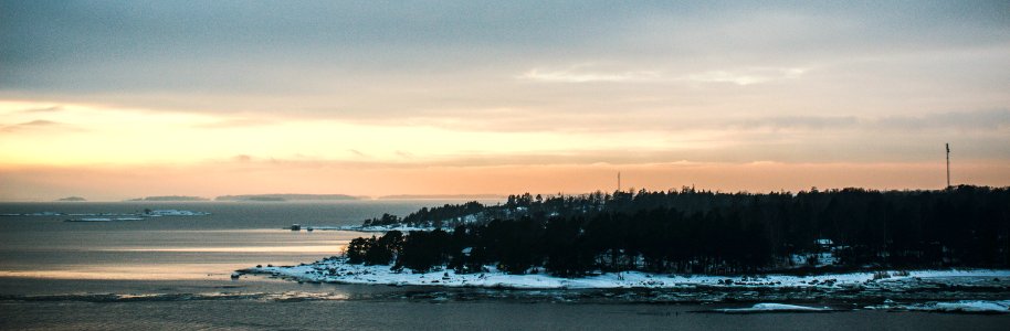 Panoramic Photo Of Island During Golden Hour photo