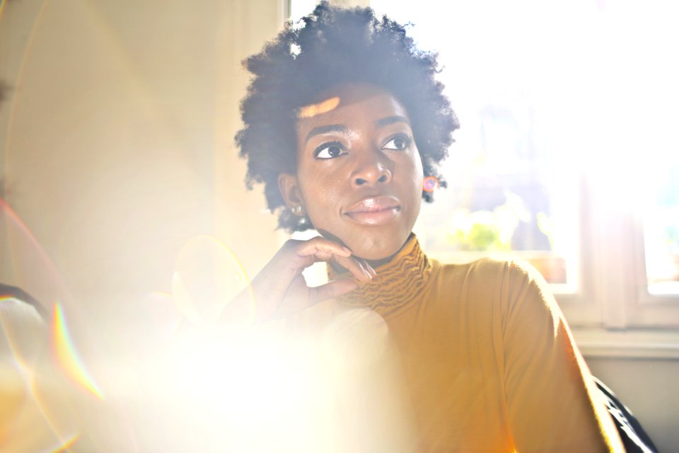 Woman In Yellow Turtle-neck Long-sleeved Top Posing For Photo
