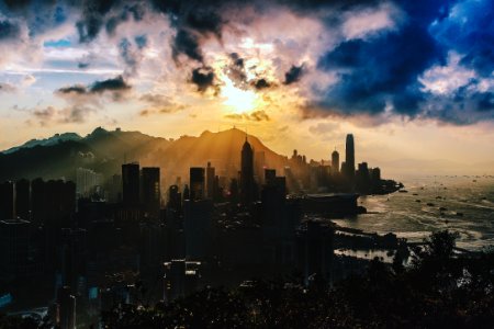 Birds Eye View Of City Near Ocean During Sunset photo