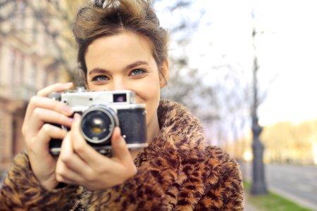 Woman Holding Black And Gray Camera Focus Photo