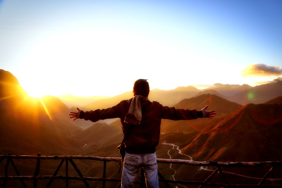 Man In Black Jacket Standing Near Sunset