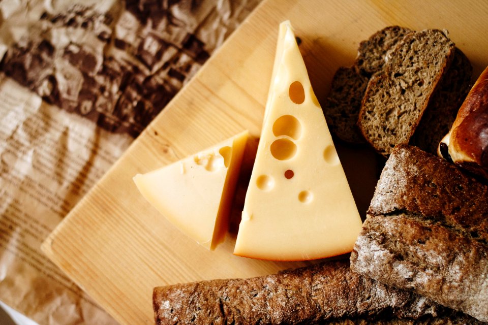 Sliced Cheese On Brown Table Top