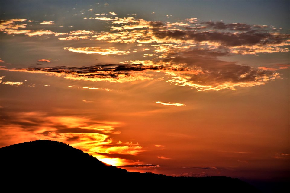 Mountain Ruin Silhouette During Golden Hour photo