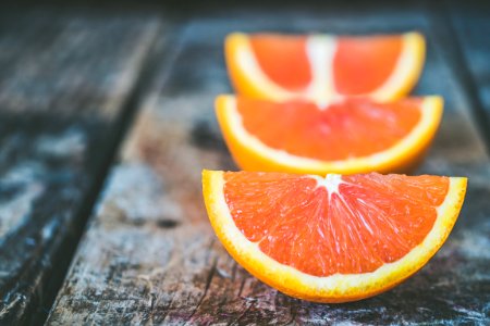 Three Sliced Orange Fruits photo