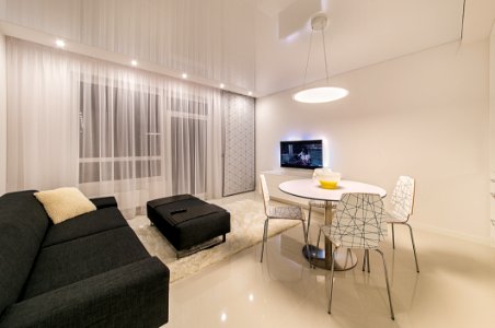 Black Fabric Sofa Near Round White Table photo