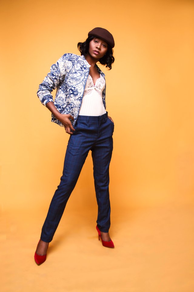 Woman In Blue And White Jacket And Blue Dress Pants