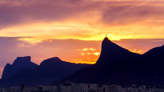 Silhouette Of Mountains With Cross