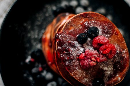 Selective Focus Photography Of Raspberry And Blueberry Pancakes photo