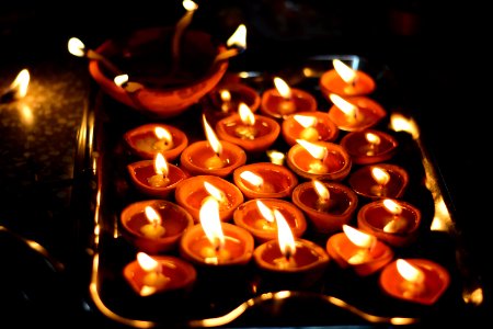 Photo Of Tealight Candles On Stainless Steel Tray photo