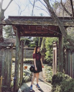 Shallow Focus Photography Of Woman In Maroon And Black Dress photo