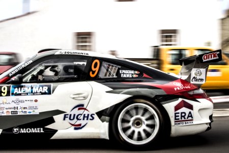 Photography Of Person Driving Porsche