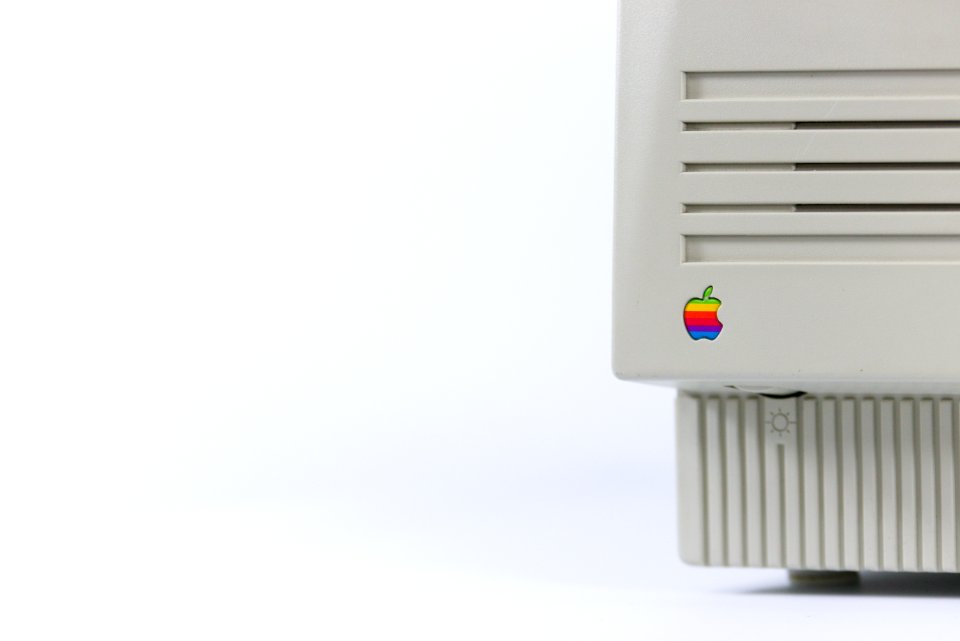 Gray Device With Apple Logo On White Surface