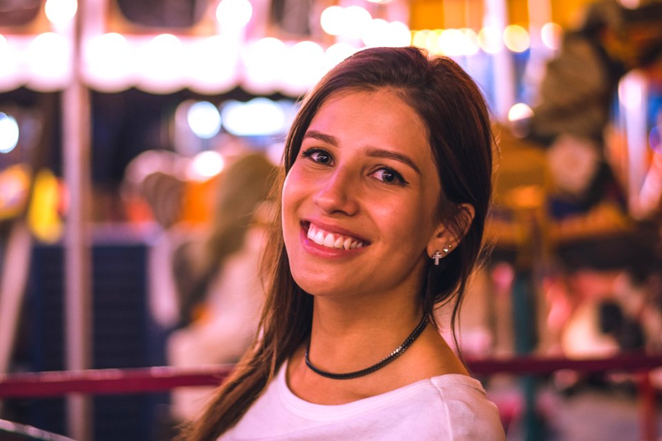 Close-Up Photography Of A Woman Smiling photo