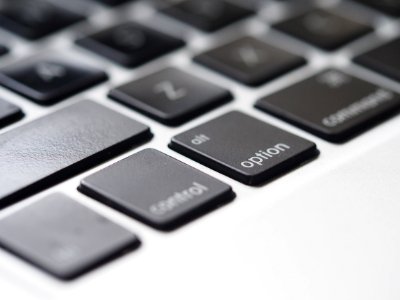 Close-Up Photography Of Macbook Keyboard photo