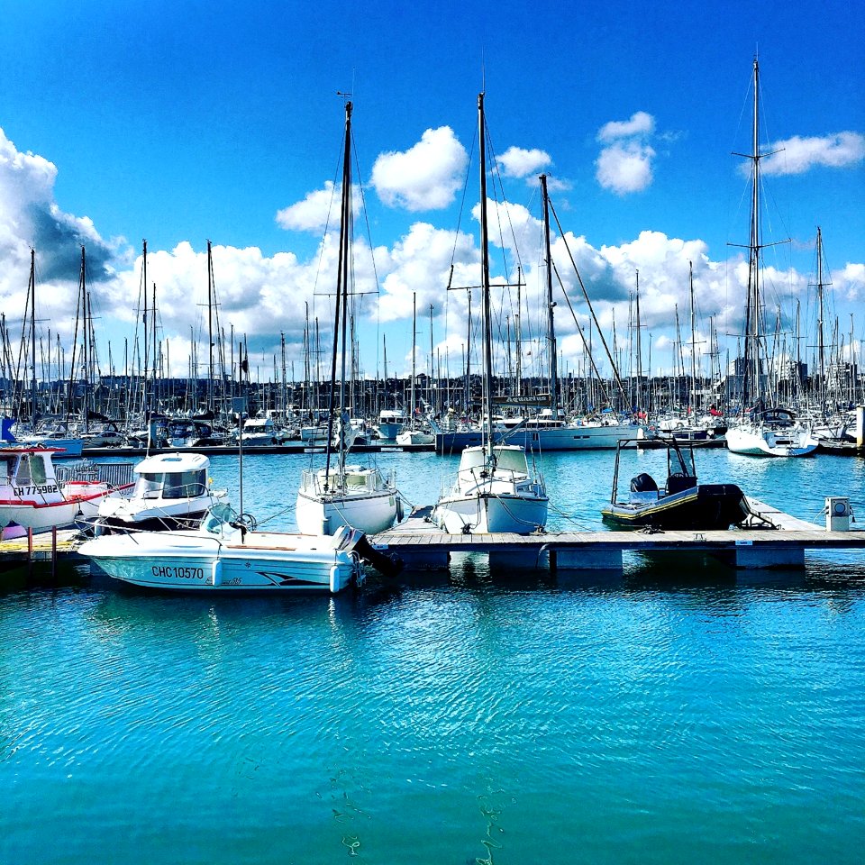 Three White Motorboat On Body Of Water