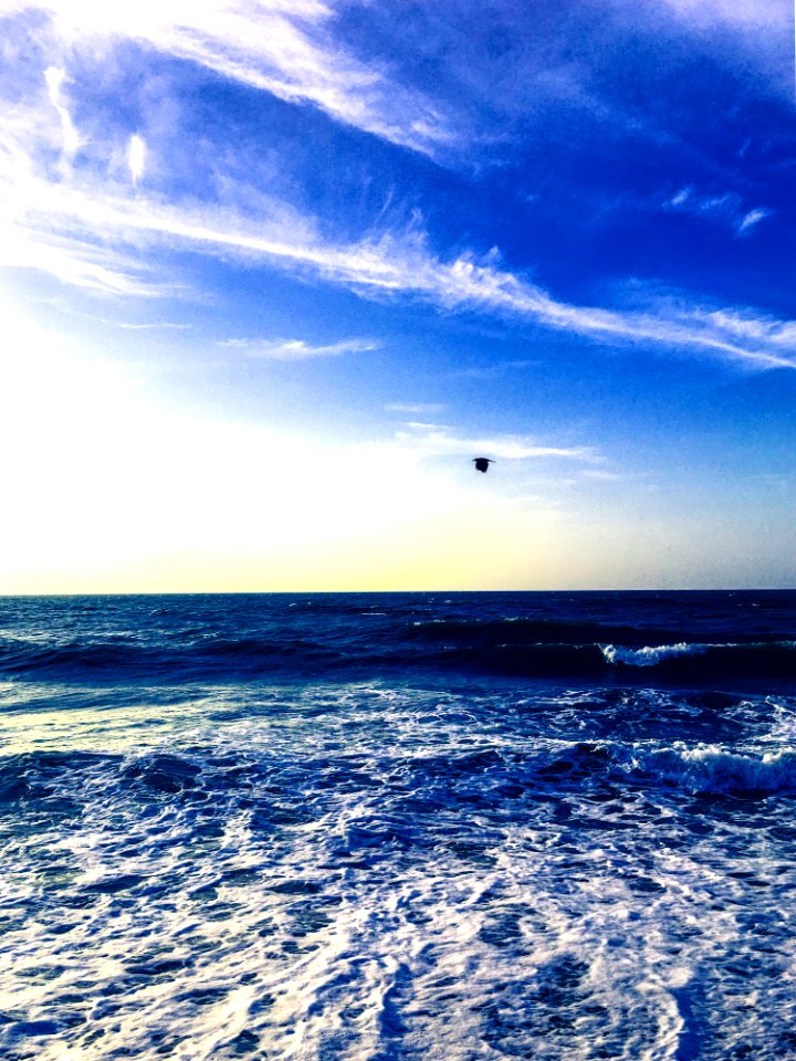 Photography Of Water Waves Under Cloudy Sky