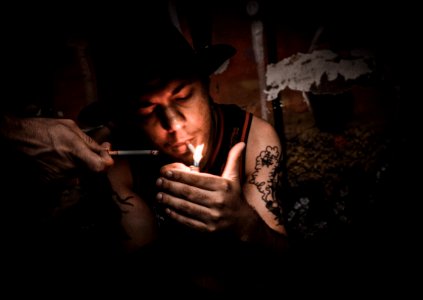 Man Lighting Cigarette photo