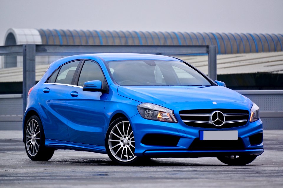 Photography Of A Blue Mercedes-benz 5-door Hatchback