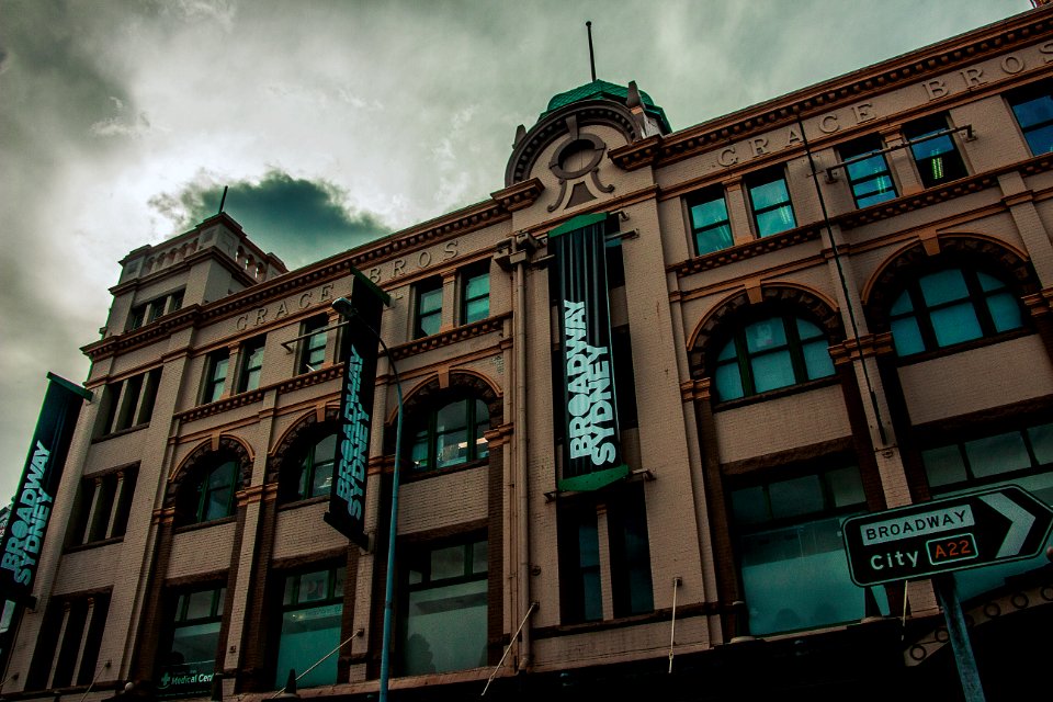 Low Angled Photography Of Brown Building photo