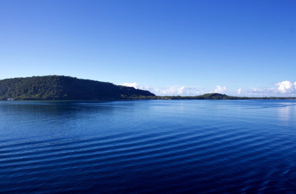 Landscape Photography Of Body Of Water Near Mountain