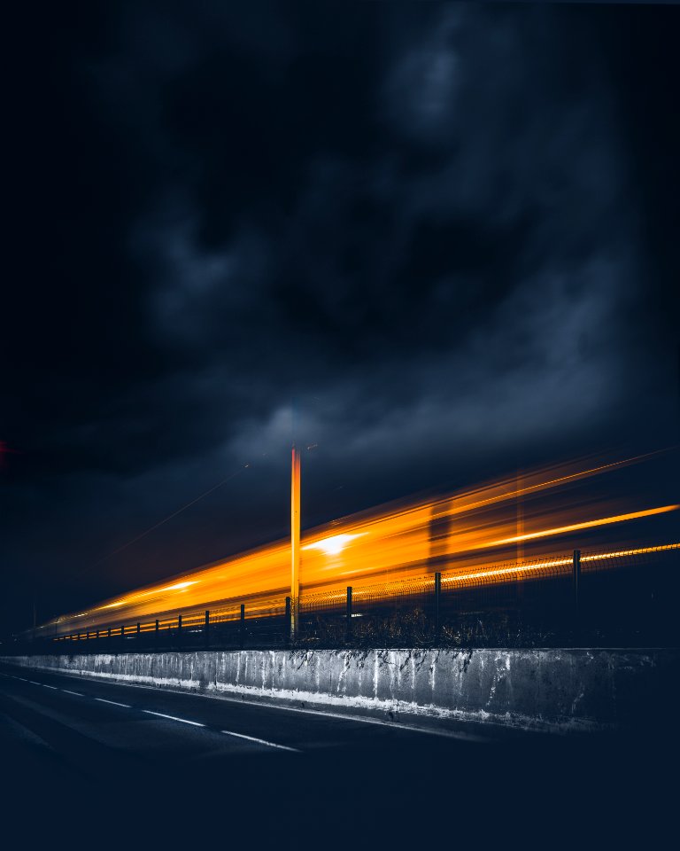 Timelapse Photography Of Bridge During Nighttime