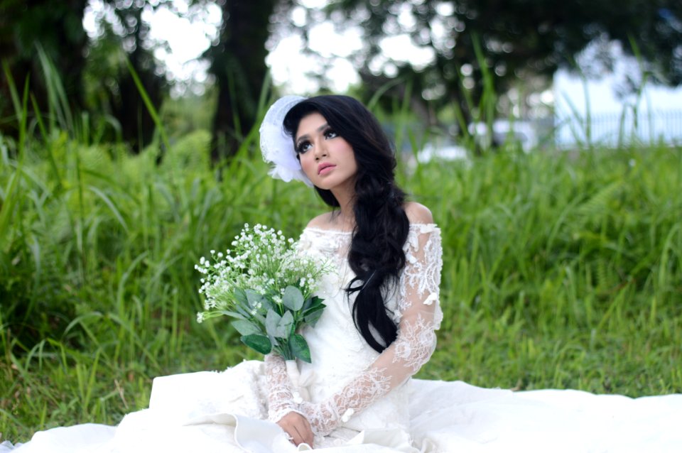 Woman Wearing Of White Off-shoulder Bridal Dress photo