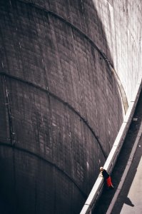 Woman Wearing Black Shirt Looking Down Through Hoovers Dam photo