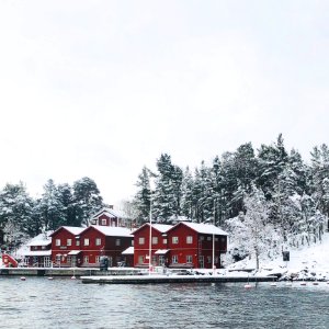 Red Concrete Houses Surrounded With Snow photo