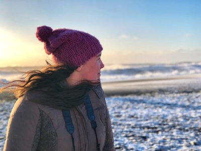 Woman In Gray Full-zip Jacket On Snowy Field photo